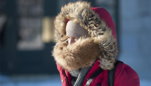 Woman feeling cold in Canada
