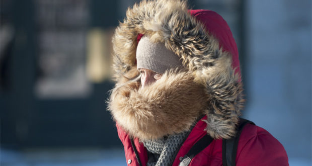 Woman feeling cold in Canada